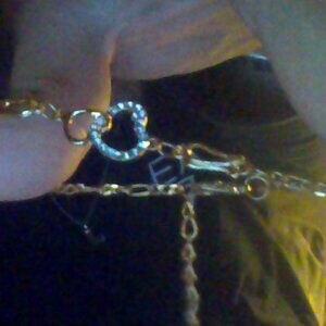 fine gold bracelet with hearts and diamond chips